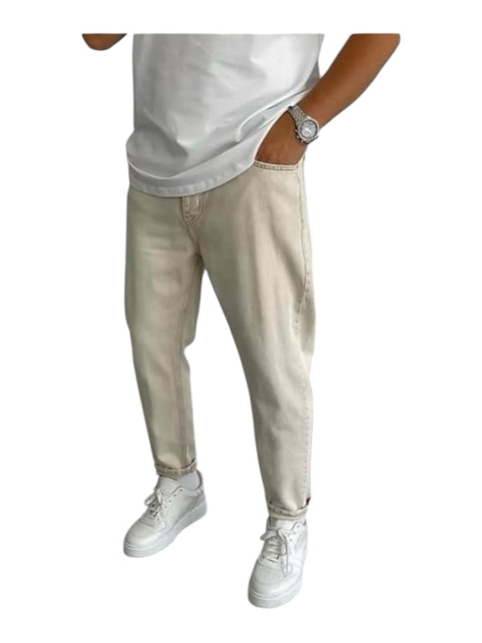 Gravity man beige boyfriend fit jeans worn with a white t-shirt and white sneakers
